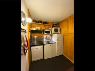 Cuisine ou kitchenette dans l'établissement Résidence Lauzieres - Appartement 3 pièces pour 8 personnes skis aux pieds et proche des commerces dans le village du Charvet à Arc 1800 MAE-4484
