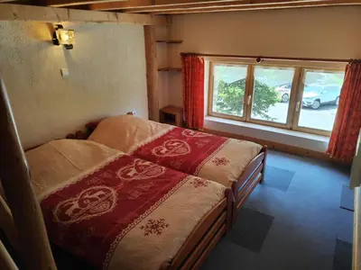 Un ou plusieurs lits dans un hébergement de l'établissement Chalet Le Grand Méan