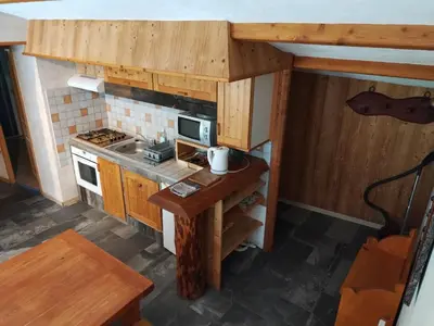 Cuisine ou kitchenette dans l'établissement Chalet Le Grand Méan