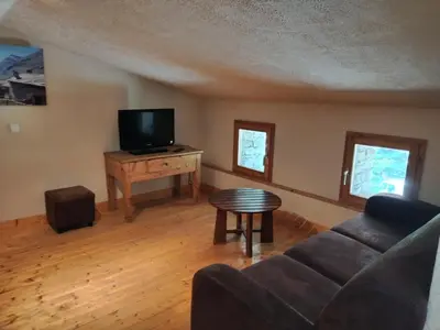 Télévision ou salle de divertissement dans l'établissement Chalet Le Grand Méan