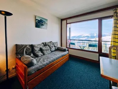 Coin salon dans l'établissement Résidence Ruitor Arc 1800 - Appartement 2 pièces pour 4 personnes avec un jolie vue sur la vallée, proche du télécabine dans le village de Charmettoger à Ar MAE-1783