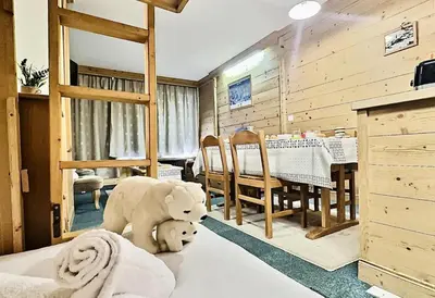 Coin salon dans l'établissement Résidence Le Pramecou - Appartement de charme 6 personnes à Tignes proche des pistes et des commerces dans le quartier du Val Claret. Appartement situé MAE-2016