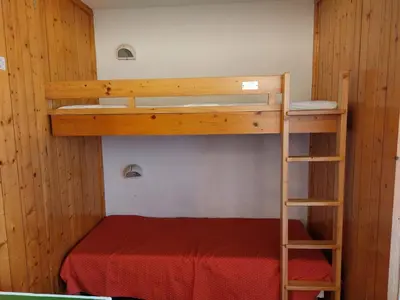 Un ou plusieurs lits superposés dans un hébergement de l'établissement Résidence Nova - Appartement 2 pièces 6 personnes proche des pistes, des commerces, de la garderie et de l'ESF au centre de la station d’Arc 1800 MAE-1877