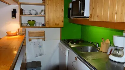 Cuisine ou kitchenette dans l'établissement Résidence Aiguille Grive Bat Iii - Appartement 2 pièces 6 personnes en duplex, skis aux pieds, dans le village de Charmettoger à Arc 1800 MAE-1895