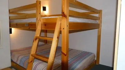 Un ou plusieurs lits superposés dans un hébergement de l'établissement Résidence Aiguille Grive Bat Iii - Appartement 2 pièces 6 personnes en duplex, skis aux pieds, dans le village de Charmettoger à Arc 1800 MAE-1895