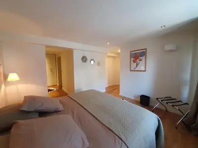 Un ou plusieurs lits dans un hébergement de l'établissement Appartement Gentiane de 85m2 avec sauna à 10 min des pistes