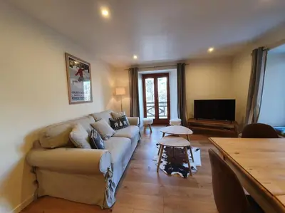 Télévision ou salle de divertissement dans l'établissement Appartement Marquise de 110m2 avec vue et sauna à 10 min des pistes