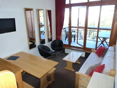 Télévision ou salle de divertissement dans l'établissement Résidence Aiguille Grive Bat Ii - Joli 3 pièces en duplex pour 6 personnes, avec une vue plongeante sur la vallée, proche des pistes dans le village de Charmettog MAE-1714