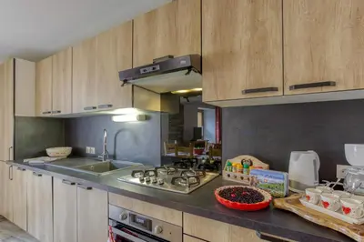 Cuisine ou kitchenette dans l'établissement Le Chasseforêt