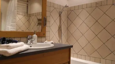 Salle de bains dans l'établissement Chalet Les Alpes