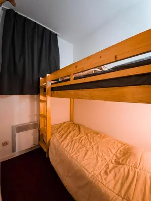 Un ou plusieurs lits dans un hébergement de l'établissement Résidence Ruitor Arc 1800 - Appartement 3 pièces pour 6 personnes dans une résidence calme, proche du télécabine dans le village de Charmettoger à Arc 1800 MAE-1722