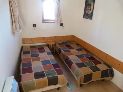 Un ou plusieurs lits dans un hébergement de l'établissement Résidence Armoise - Appartement 2 pièces / 6 personnes à Arc 1800 en centre station, proche des pistes et des commerces, dans le village des Villard MAE-1879