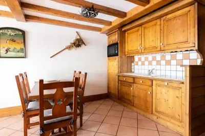 Cuisine ou kitchenette dans l'établissement Résidence Les Alpages de Chantel - maeva Home - Appartement 3 Pièces 6 Personnes - Sélection MAE-1652
