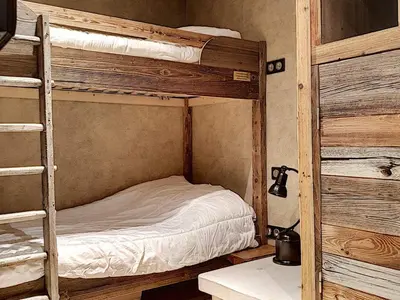 Un ou plusieurs lits dans un hébergement de l'établissement Appartement Centre Val-d'Isère pour 6 pers, Balcon Ensoleillé - FR-1-518-87