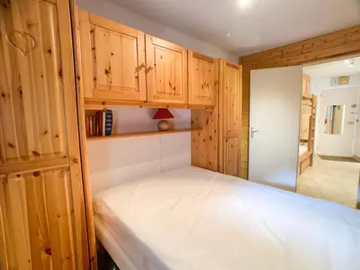 Un ou plusieurs lits dans un hébergement de l'établissement Appartement Confortable Pied des Pistes avec Balcon - FR-1-502-269