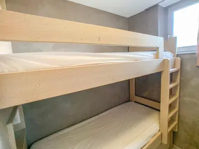 Un ou plusieurs lits superposés dans un hébergement de l'établissement Studio cabine au pied des pistes, animaux acceptés - FR-1-502-286