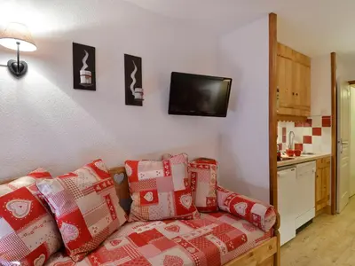 Télévision ou salle de divertissement dans l'établissement Appartement skis aux pieds, rénové, 5 pers. - FR-1-181-1953