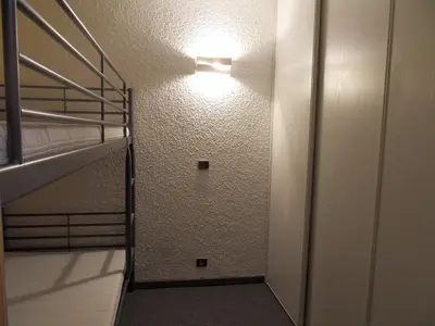 Un ou plusieurs lits dans un hébergement de l'établissement Studio rénové 2019 · Ski aux pieds · Balcon · 4 pers - FR-1-181-1997