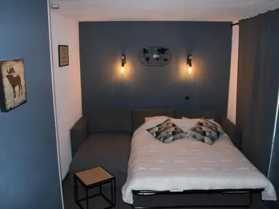 Un ou plusieurs lits dans un hébergement de l'établissement Studio rénové 2019 · Ski aux pieds · Balcon · 4 pers - FR-1-181-1997