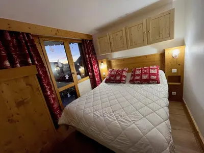 Un ou plusieurs lits dans un hébergement de l'établissement Appartement chaleureux au pied des pistes, 7 personnes - FR-1-181-2020