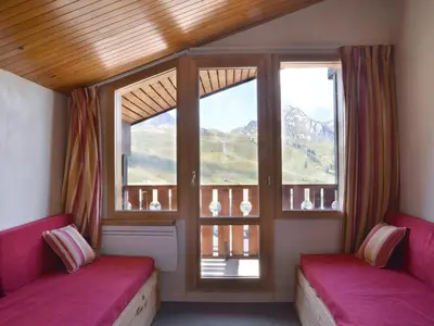 Un ou plusieurs lits dans un hébergement de l'établissement Appartement fonctionnel de 2 pièces avec balcon et casier à ski - FR-1-181-2155