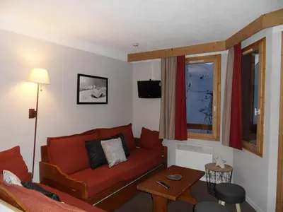 Coin salon dans l'établissement Appartement cosy skis aux pieds, animaux admis - FR-1-181-2157