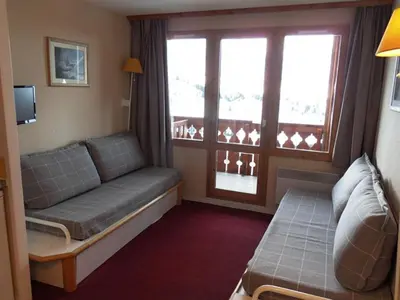 Coin salon dans l'établissement Appartement fonctionnel 2 pièces au pied des pistes, animaux admis - FR-1-181-2153