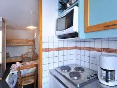 Cuisine ou kitchenette dans l'établissement Studio fonctionnel aux pieds des pistes avec animaux admis - FR-1-181-2181