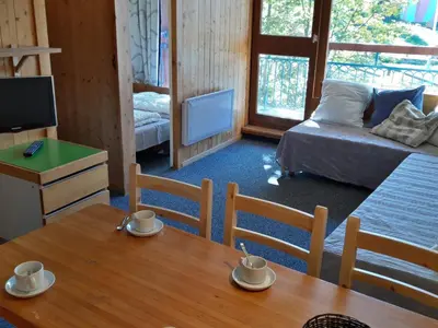 Coin salon dans l'établissement Appartement 2 pièces · Balcon · Wifi gratuit - FR-1-346-407