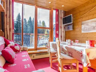 Télévision ou salle de divertissement dans l'établissement Duplex confortable, proche des pistes, balcon sud - FR-1-346-412