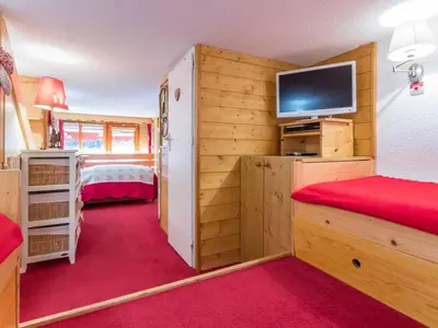 Un ou plusieurs lits dans un hébergement de l'établissement Duplex confortable, proche des pistes, balcon sud - FR-1-346-412