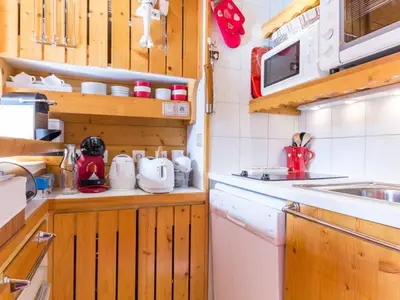 Cuisine ou kitchenette dans l'établissement Duplex confortable, proche des pistes, balcon sud - FR-1-346-412