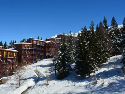 L'établissement Duplex confortable ski aux pieds avec balcon - FR-1-346-411 en hiver