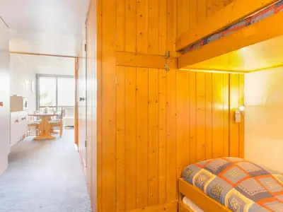 Un ou plusieurs lits dans un hébergement de l'établissement Studio lumineux 5 pers, ski aux pieds, balcon - FR-1-346-425