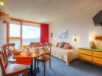 Un ou plusieurs lits dans un hébergement de l'établissement Appartement lumineux au centre, balcon, 5 pers - FR-1-346-432