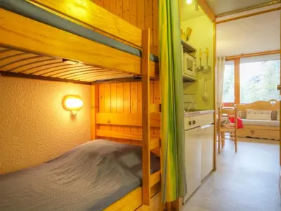 Un ou plusieurs lits dans un hébergement de l'établissement Studio confortable aux Arcs 1800 · Balcon · WIFI inclus - FR-1-346-473