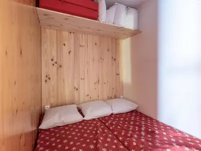 Un ou plusieurs lits dans un hébergement de l'établissement Appartement calme Centre station Balcon - FR-1-346-494
