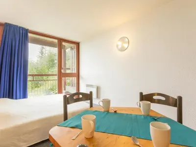 Un ou plusieurs lits dans un hébergement de l'établissement Studio cabine avec balcon et WIFI gratuit - FR-1-346-508