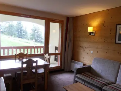 Coin salon dans l'établissement Appartement à Belle Plagne, accès pistes, 4 pers. - FR-1-181-2317