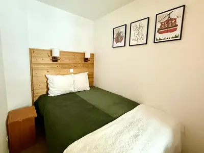 Un ou plusieurs lits dans un hébergement de l'établissement Appartement rénové accès pistes 5 pers. - FR-1-181-2427