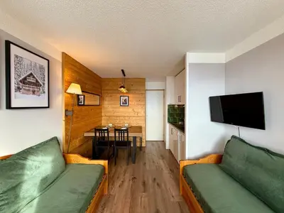 Télévision ou salle de divertissement dans l'établissement Appartement rénové accès pistes 5 pers. - FR-1-181-2427