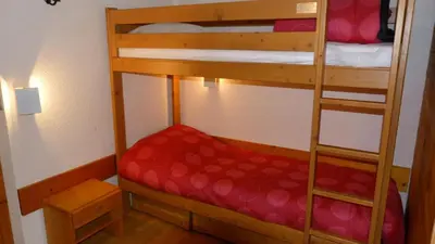 Un ou plusieurs lits dans un hébergement de l'établissement Résidence Aiguille Grive Bat Iii - Appartement 2 pièces 6 personnes en duplex, skis aux pieds, dans le village de Charmettoger à Arc 1800 MAE-1696