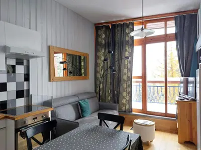 Coin salon dans l'établissement Résidence Aiguille Grive Bat Ii - Très bel appartement de 2 pièces, rénové pour 5 personnes, proche des pistes dans le village de Charmettoger à Arc 1800 MAE-1743