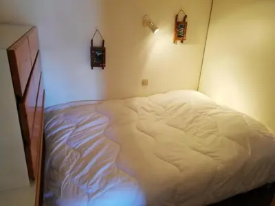 Un ou plusieurs lits dans un hébergement de l'établissement Résidence Archeboc - Appartement 5 personnes à Arc 1800 proche des pistes dans le village de Charmettoger MAE-6562