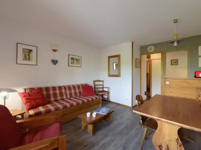 Coin salon dans l'établissement Appartement cosy 2 pièces, proche pistes, balcon, animaux acceptés - FR-1-181-2177