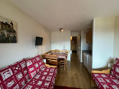 Télévision ou salle de divertissement dans l'établissement Appartement confortable 5 pers au pied des pistes - FR-1-181-2055