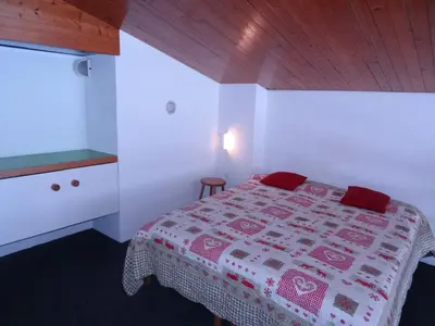 Un ou plusieurs lits dans un hébergement de l'établissement Résidence Tournavelles - Appartement 4 pièces 8 personnes avec vue sur les pistes, skis aux pieds et proche des commerces dans le village des Villards à MAE-2008
