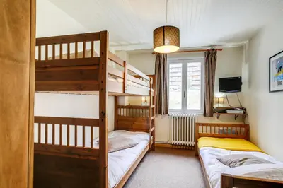 Un ou plusieurs lits dans un hébergement de l'établissement Résidence Les Armaillis - Appartement de charme 3 pièces 7 personnes à Tignes proche des commerces, du bowling, de la piscine et des pistes dans le quart MAE-2175