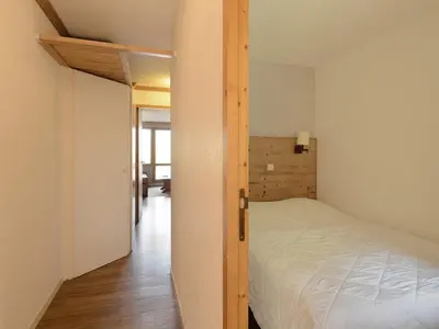 Un ou plusieurs lits dans un hébergement de l'établissement Appartement cosy, accès direct pistes, 5 pers, Belle Plagne - FR-1-181-2386