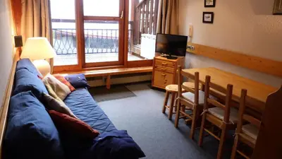 Coin salon dans l'établissement Résidence Aiguille Grive Bat Iii - Appartement 2 pièces 6 personnes en duplex, skis aux pieds, dans le village de Charmettoger à Arc 1800 MAE-2032